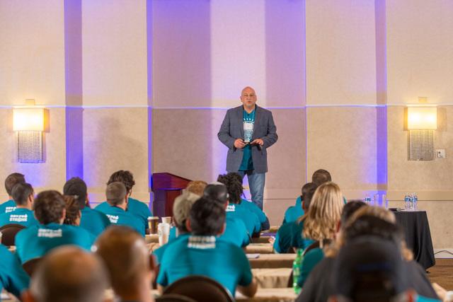 This picture shows our CEO, Ron, speaking to the Dry Pro team during our annual training day.