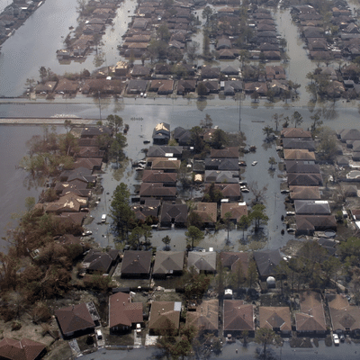 The picture shows a town flooded after a hurricane hits.