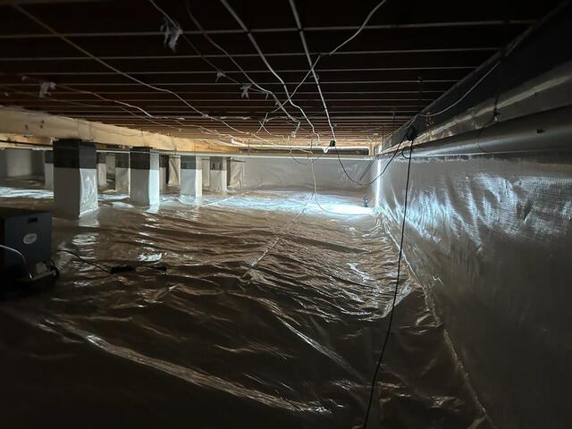 Crawl Space encapsulation with a dehumidifier.