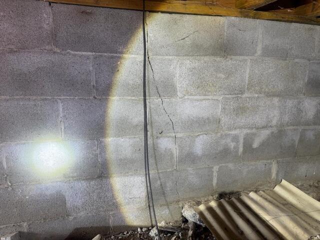 Efflorescence on the crawl space wall