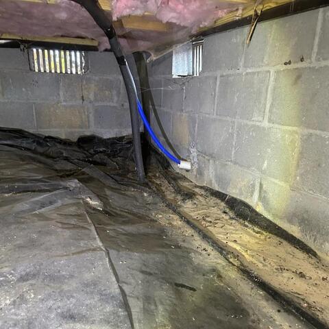 Open vents in a crawl space.
