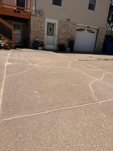 Saving a Le Claire Driveway: How Our Team Tamed a Tricky Trip Hazard - Image 2