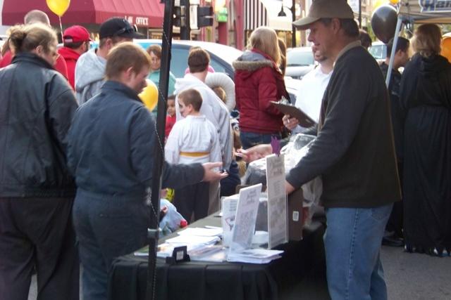 Woods Hands Out Sweet Treats at Downtown Belleville's Trick-or-Treat Main S...