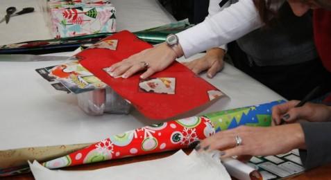 Volunteers Help Make Christmas Shopping Affordable for More Than 30 Low-Inc...