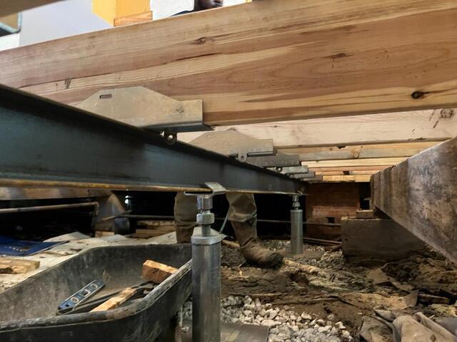 SmartJacks and supplemental beam installed for sagging floor repair in Indianola MS crawl space.