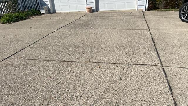 How Do I Fix Cracked or Uneven Concrete on My Sidewalk or Driveway?