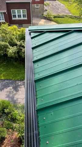 gutter-guards-on-a-green-roof