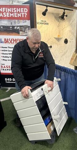David, our owner, showing a homeowner the Aspen air purifier. 