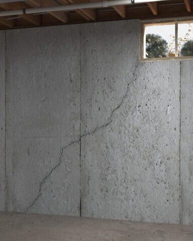 Diagonal cracks often start at the corner of a basement window, where the wall is weakest.