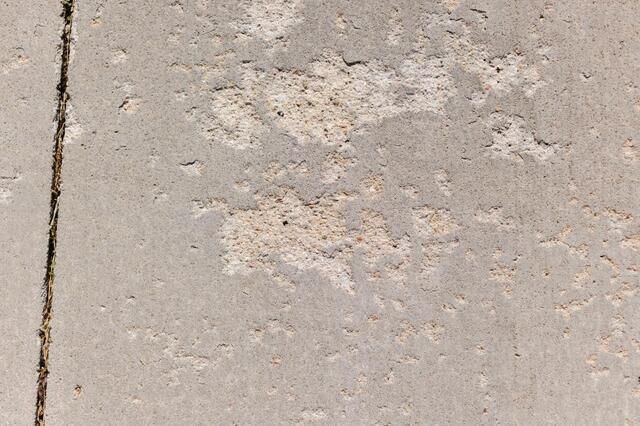 Spalled concrete surface