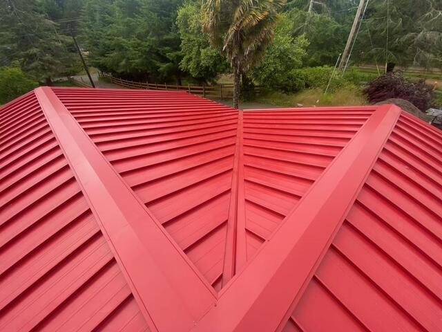 North Bend Home Gets a Bold New Look with a Red Metal Roof and Improved Attic Ventilation - Image 1