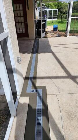 From Flooded Driveways to Dry Patios: The Power of Channel Drains in Tampa Bay - Image 5