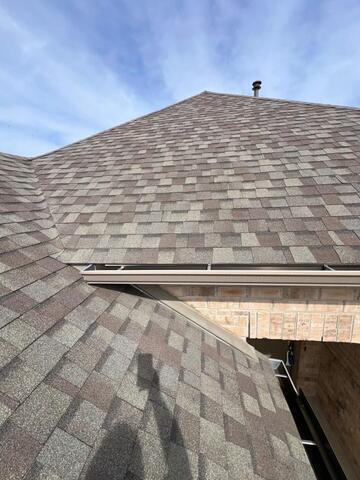 Architectural shingle roof slope inspected in McKinney, TX showing roof condition, storm exposure, shingle wear patterns, and overall roofing system performance.