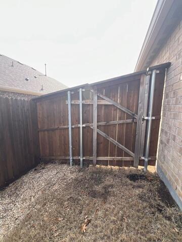 Previous roof vent repair patch visible on an architectural shingle roof in McKinney, TX during a residential roofing inspection for storm-related damage and repair history.