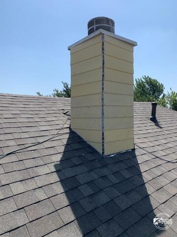 Side view of the completed chimney flashing and exterior restoration project in Allen, TX. Proper roof flashing installation helps protect vulnerable roofing transitions from water intrusion and storm-related damage.