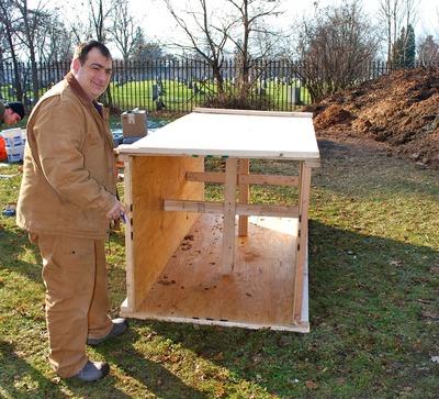 The trick was to pour the cement into this the box while piling and compacting the dirt on the outside, a little at a time each so it wouldn’t break under the pressure, while making sure the box remained level at all times.