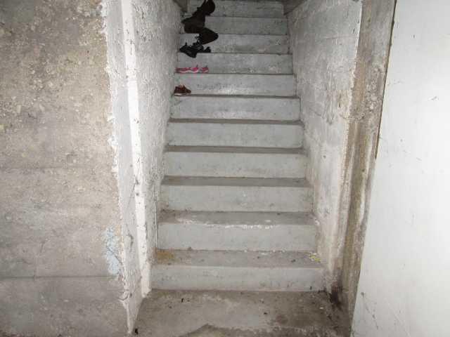 Water was coming into this basement through the stairs that led to the backyard of the home. Installing a TrenchDrain at the bottom of the steps will catch the water before it reaches your valuable items.