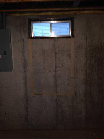 Old window that was in the basement allowed heat to escape.