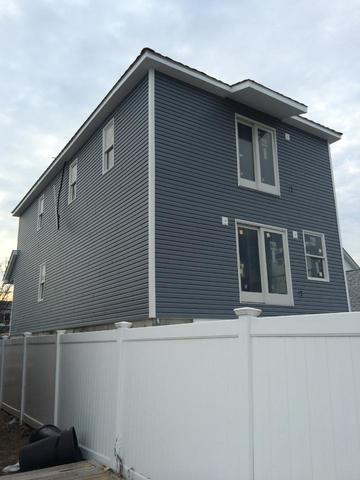 Side view of completed siding job.