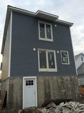 Rear of completed siding job.