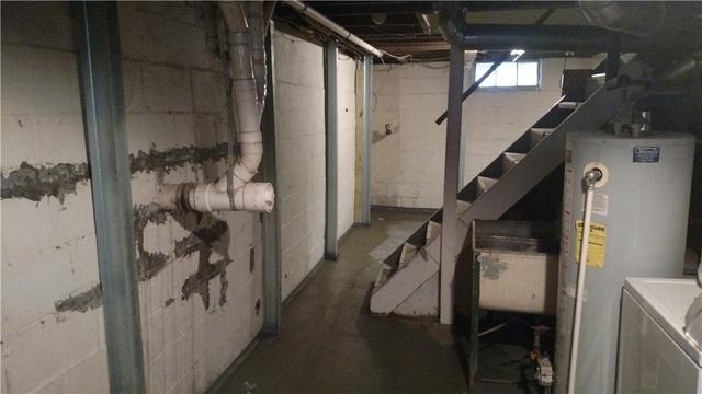 With the waterproofing system fully installed and PowerBraces in place, this basement is in much better shape than it was when we arrived.