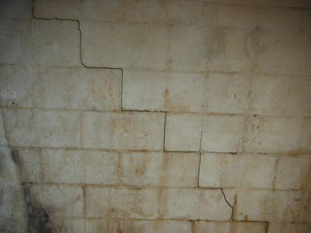 Staircase cracks in a bowing wall