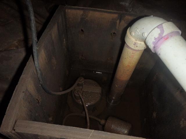 BEFORE The old pump system was not properly covered and allowed for moisture to escape into the space.