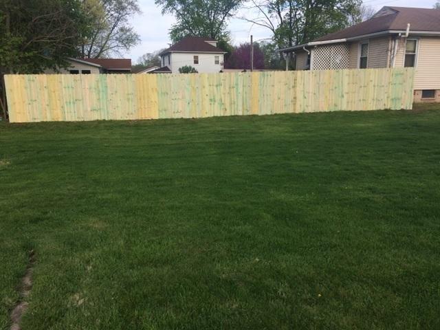 After: Brand new fence waiting to be stained or painted to their exact preferences!