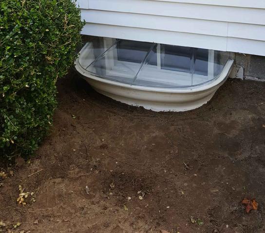 The Sunhouse window well is installed outside to let in the most sunlight. It also protects the EverLast window from weeds and other debris.