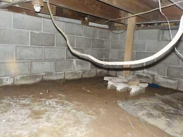 Bowing, wet walls made this basement a nightmare.