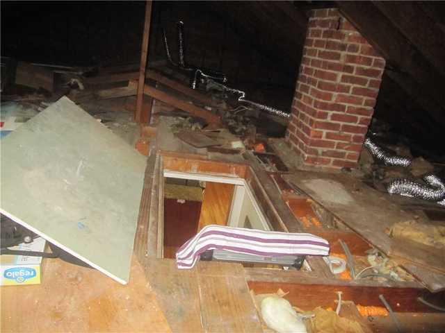 This is how the attic looked before, completely under insulated which would cause a lot of drafts due to the air leakage.