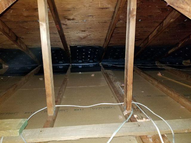 New soffit air baffles used for proper attic ventilation.