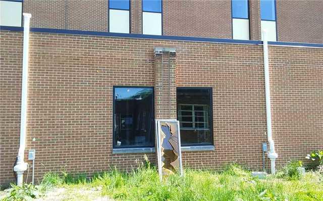 Installed exterior exhaust fan