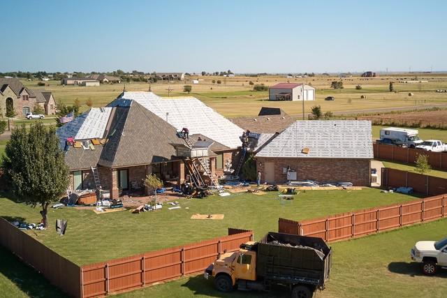 This photo is the roofing in progress with the new decking.