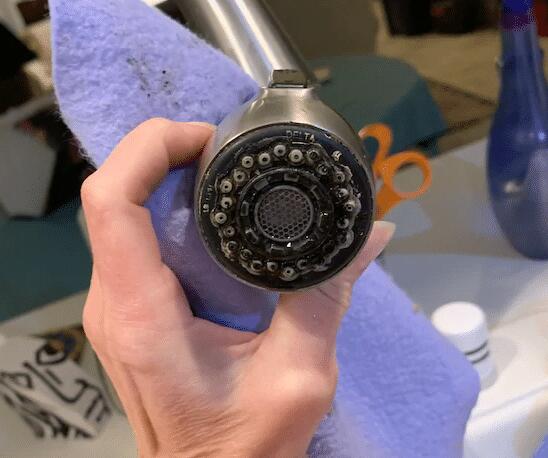 Black staining & build-upon kitchen fixture