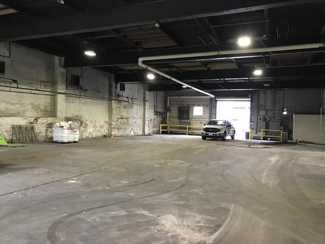 After shots of a warehouse cleaned out and broom swept. Baltimore MD.