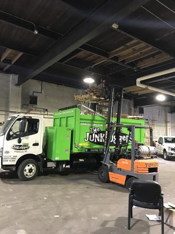 Loading the heavy items with the fork lift.