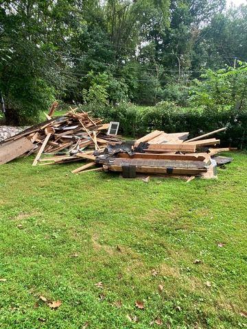 Before, shed debris