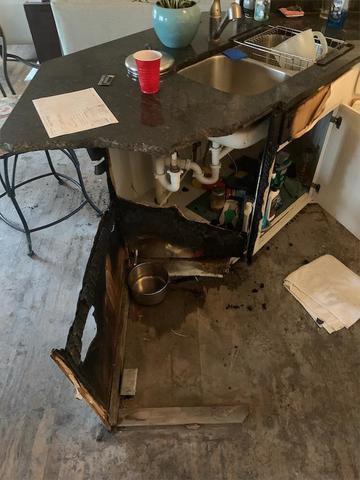 Cabinets where the dishwasher was located, not the broken Granite Countertop!