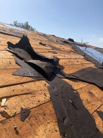 This is what we found when we removed the shingles. The decking had cracks and splitting boards.