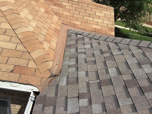 New roof tied into neighbors old roof