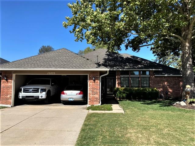 The gutters have been installed along with the new GAF Timberline HDZ in weathered wood.