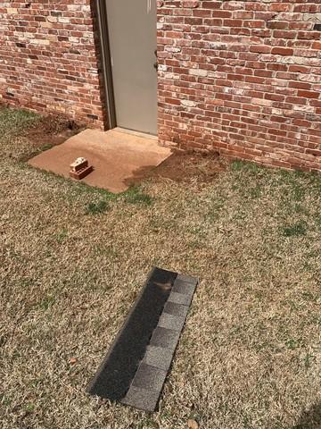 Shingles on the ground are never a good sign.