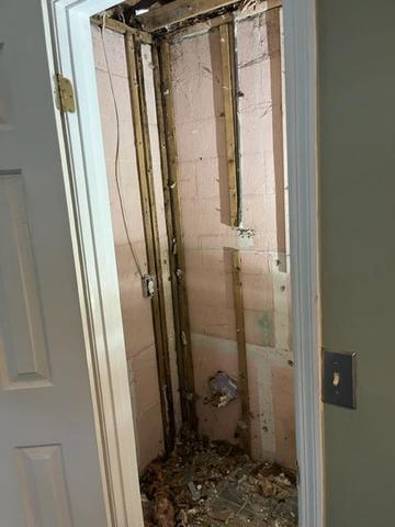 Demo of damaged walls and roof