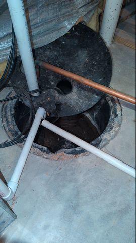 This is what the top of most sump pumps look like.  If you have one i your home, you should open it up periodically and make sure that it is not filled with mud.