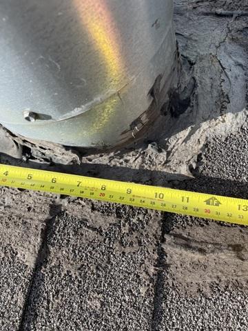 Cracking around vent stack base.
