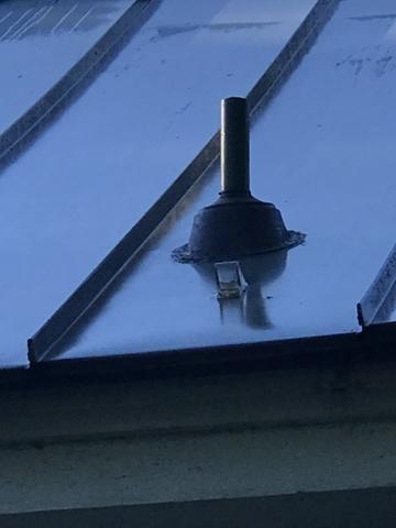 Pipe Boot on metal roof in need of repair.
