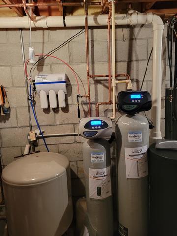 AFTER: New EVRS-1044 water softener, EVFE-1252 iron filter and UltroWater Reverse Osmosis drinking system. We were able to take out blue in-line filters, as they were no longer needed.