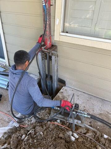 Progress image of a Push Pier being installed.