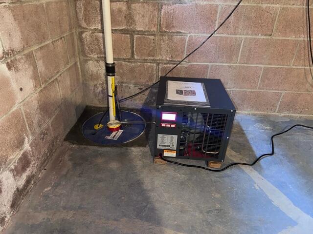 Image showing installed sump pump with Sedona Dehumidifier.